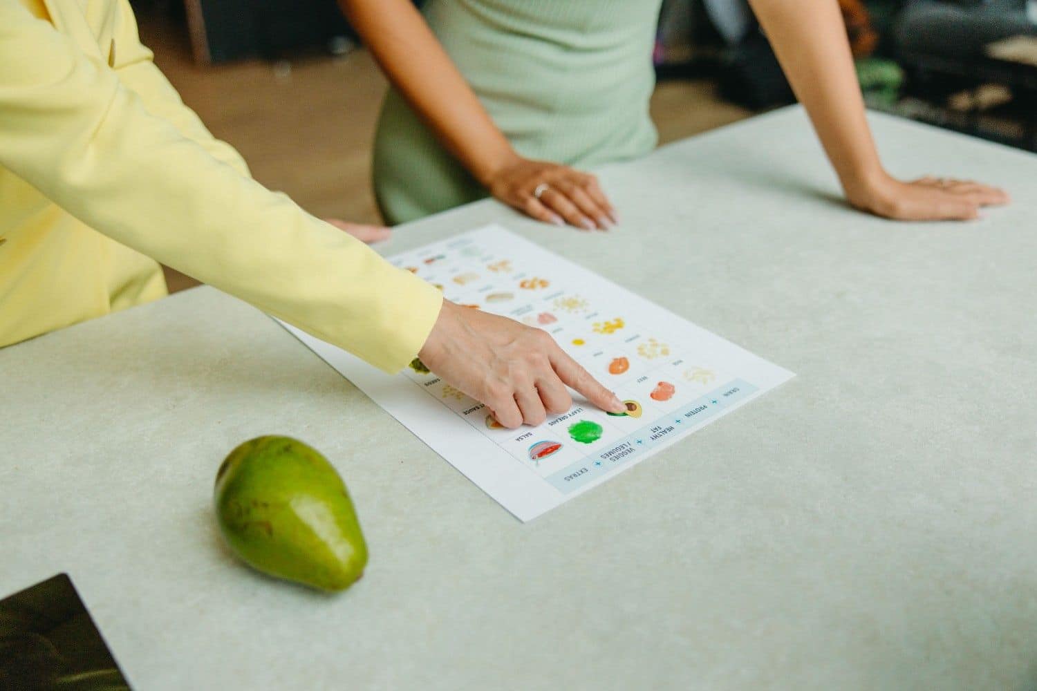 Kate Troup, Sydney naturopath, reviewing Microba microbiome test results with a client.